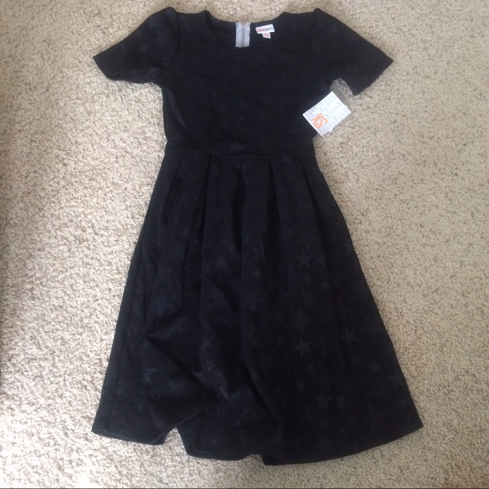 NWT Lularoe Black Star Embossed Amelia