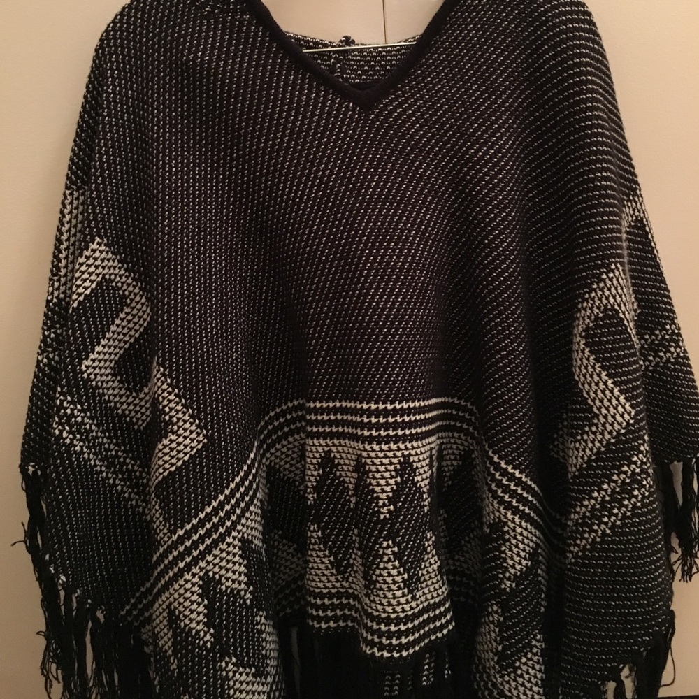 Free People hooded poncho sweater with fringe