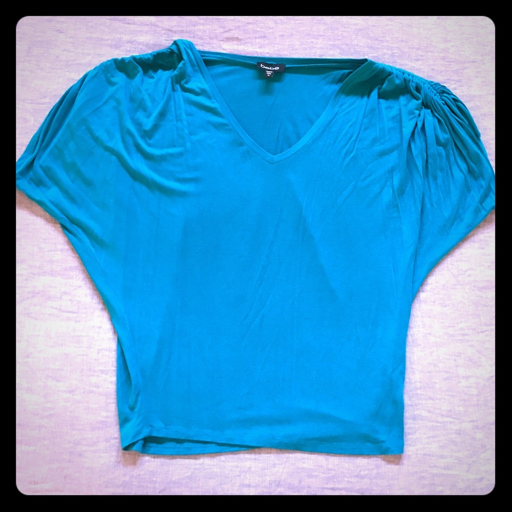 Turquoise Bebe top.