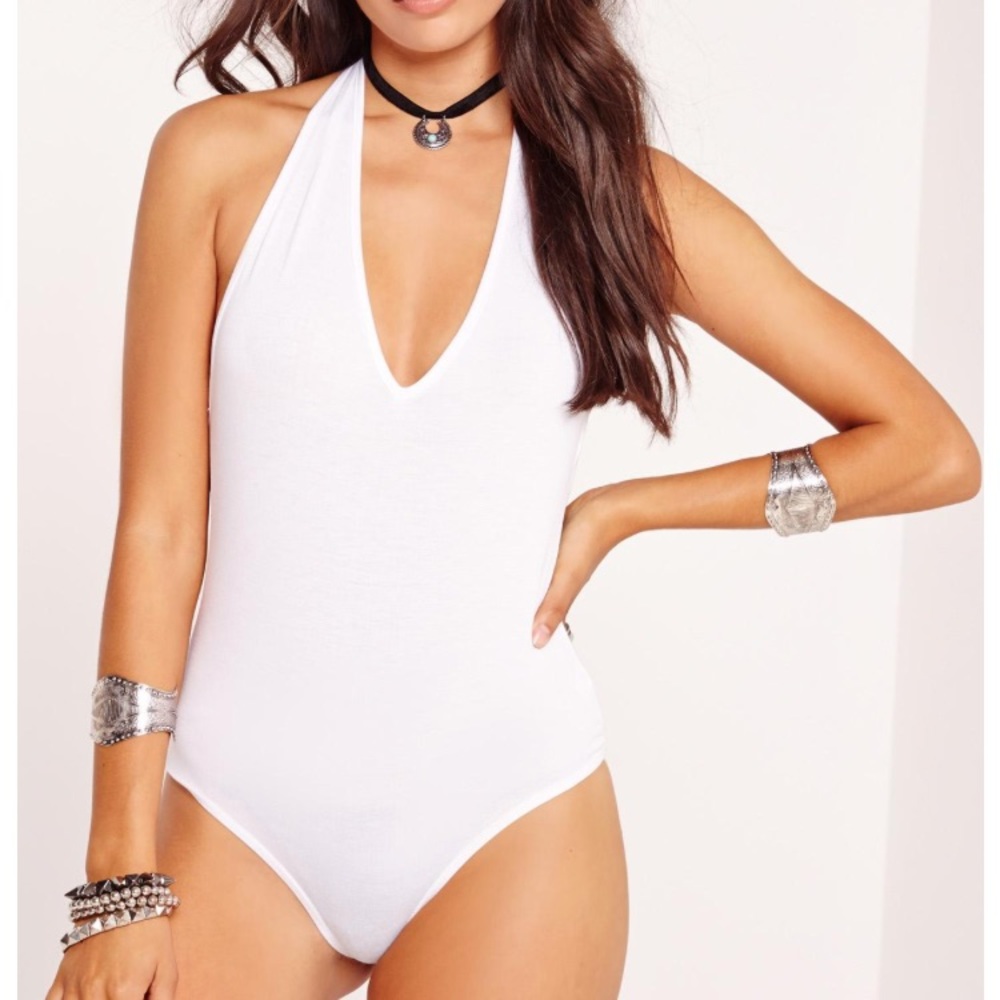 White halter neck, low back bodysuit.