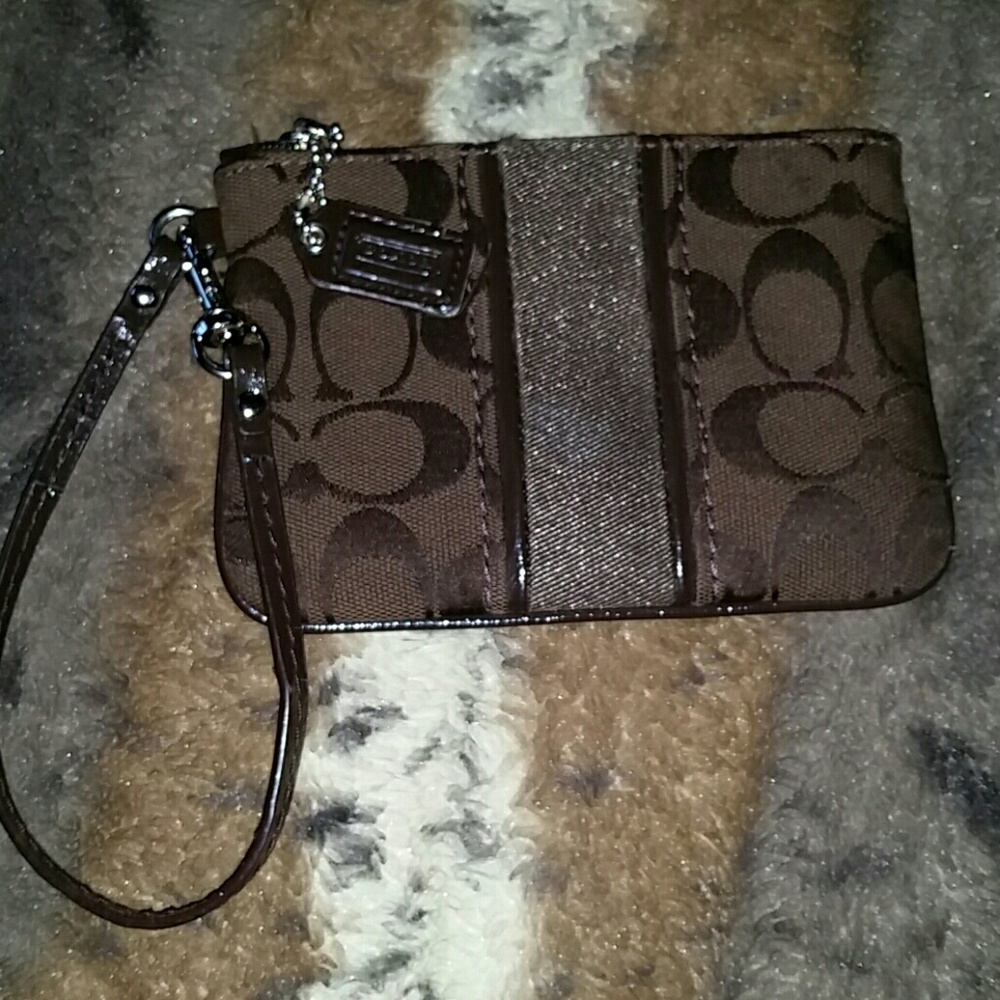 COACH wristlet brown.