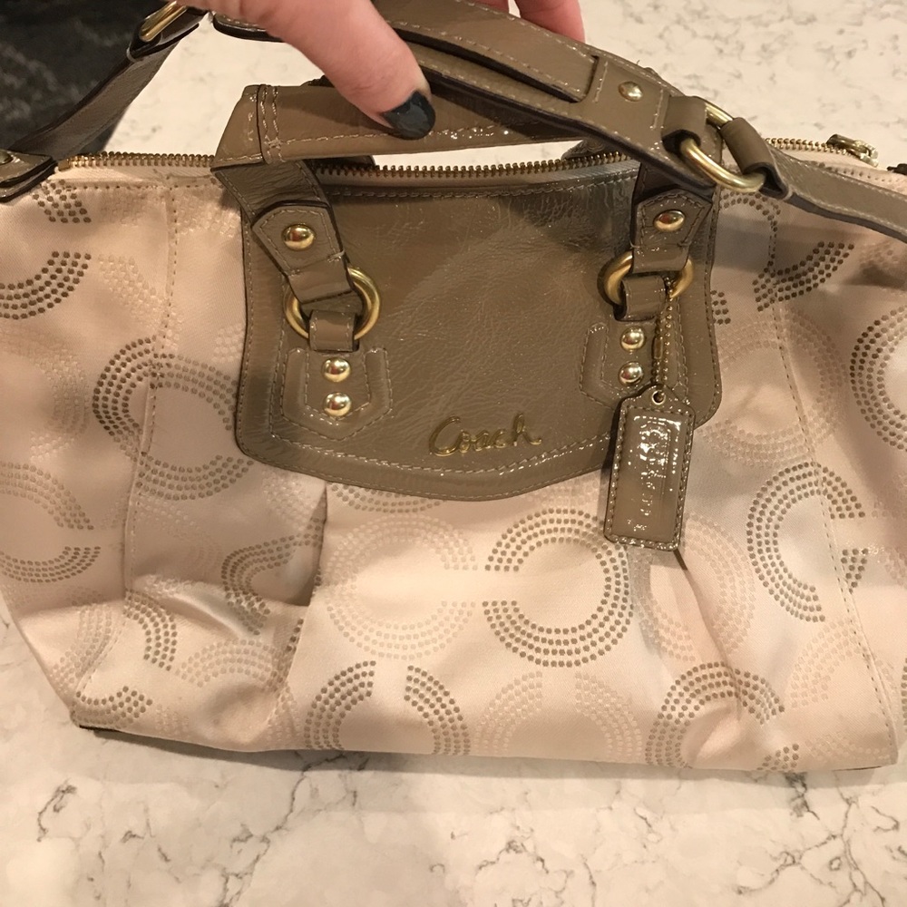 Cream coach purse