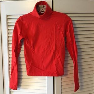 Orange cropped turtleneck from American Apparel