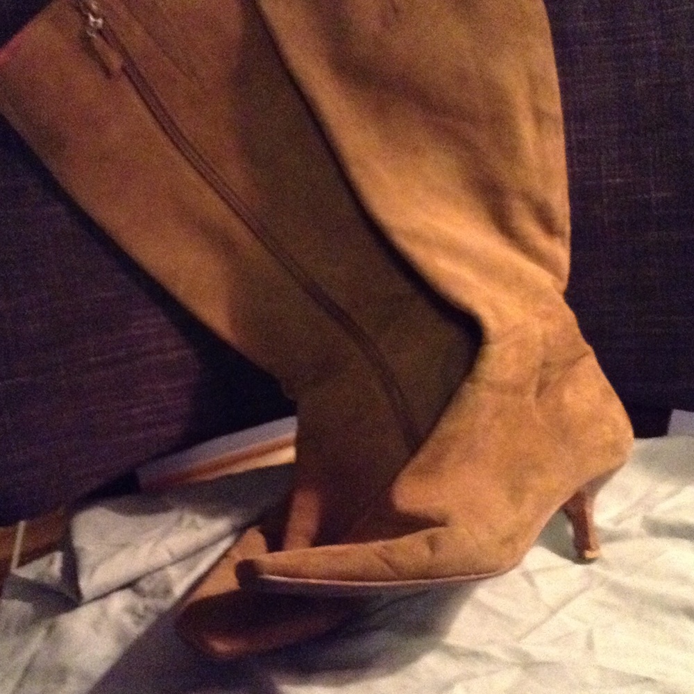 Caramel suede tall boots.