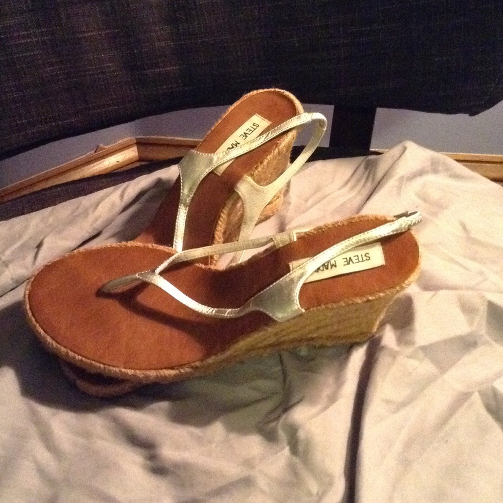 Silver leather strapped wedge shoes.