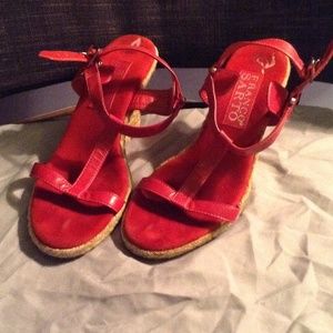 Red leather strapped wedges.