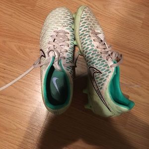 Green and white cleats