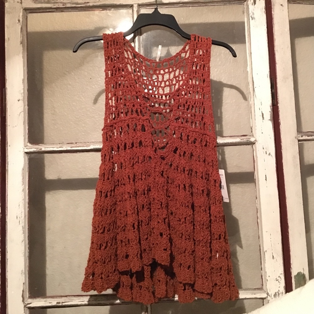 Free People terracotta vest.