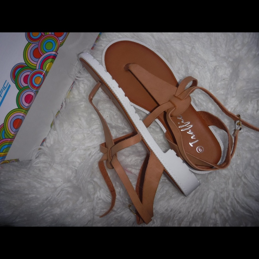 sandals . new in box .