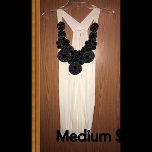 White top with black jewels