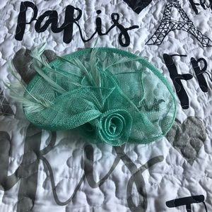 Mint green fascintor hat.