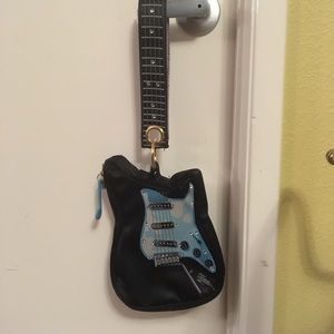Super adorable guitar wristlet 🎸😎