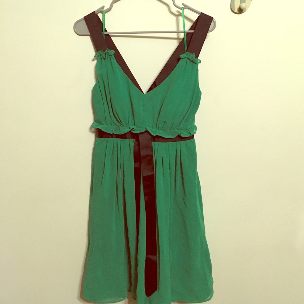 Green chiffon dress with black straps