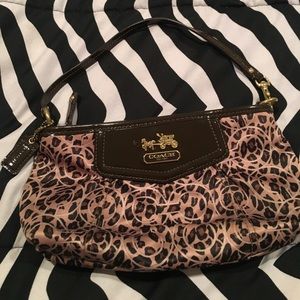 Authentic Coach small cheetah print purse.