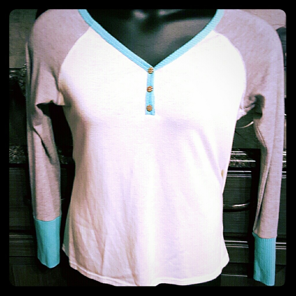 Women's knit block colored blouse.
