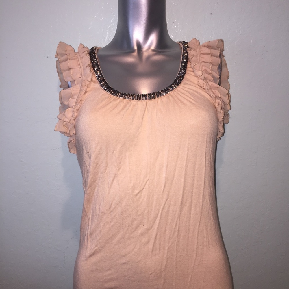 Sweet and sophisticated ruffle top