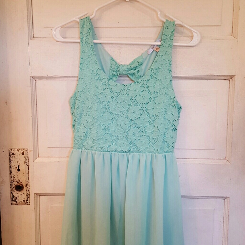 Aqua blue high low dress with cute bow back.