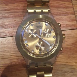 Gold Swatch watch