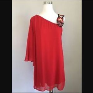One shoulder red dress.