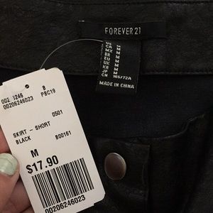 Faux Leather Skirt w/ front snap buttons