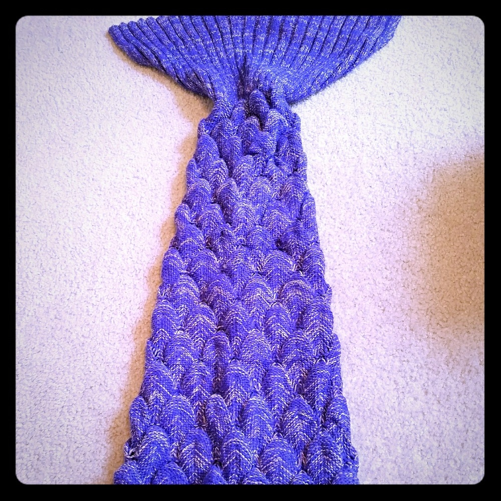 Purple and white knit mermaid tail blanket