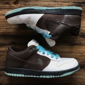 Low top Nikes. White, brown & baby blue.