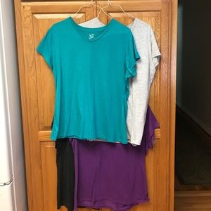 4 v-neck tee shirts. XXL