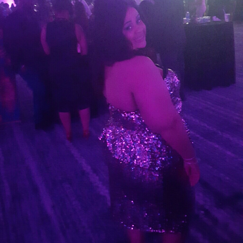 Two piece pink sequin peplum top and skirt