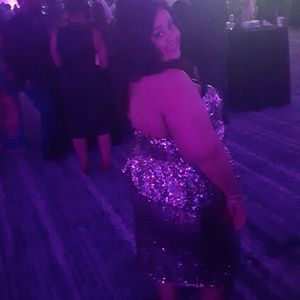 Two piece pink sequin peplum top and skirt