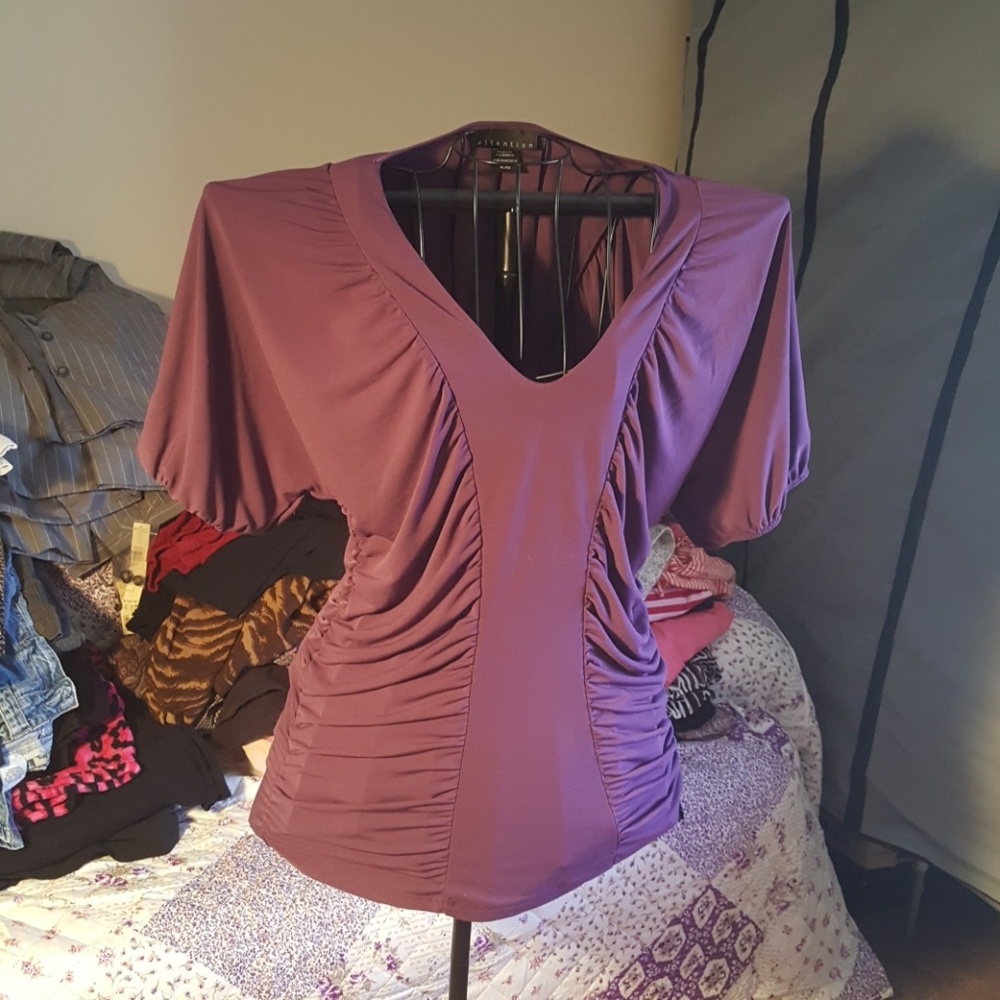 Form fitting purple blouse