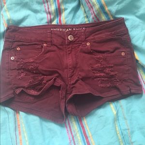 Maroon distressed American eagle shorts