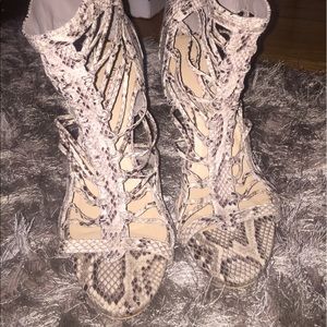 Never worn, size 11, faux snake skin heels