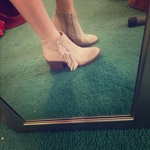 Tan fringe booties