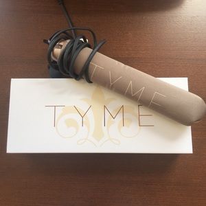 Brand new TYME Iron in it's original packaging.