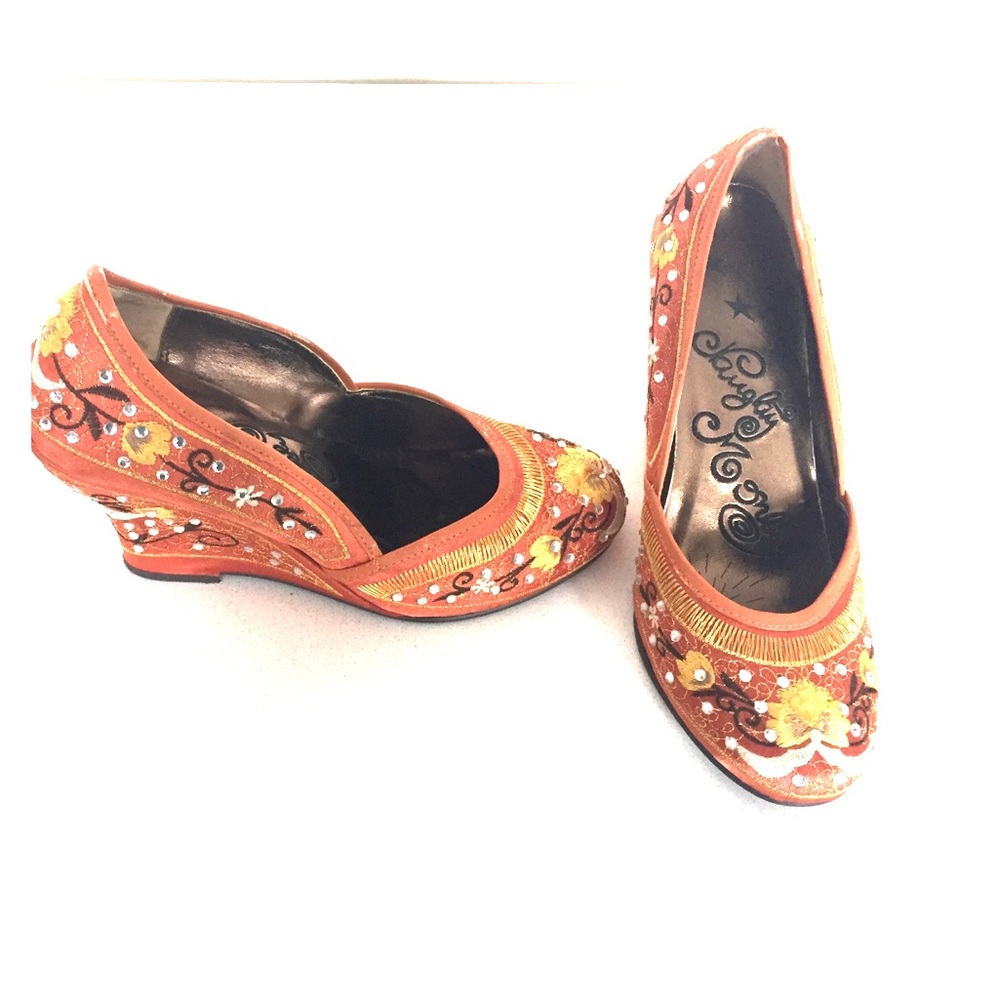 Orange Naughty Monkey wedges - size 6