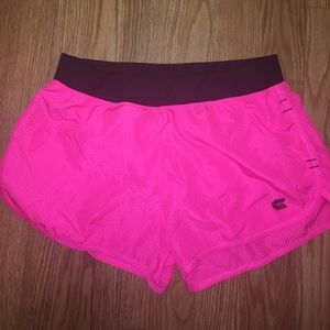 Fuchsia pink training shorts, size medium