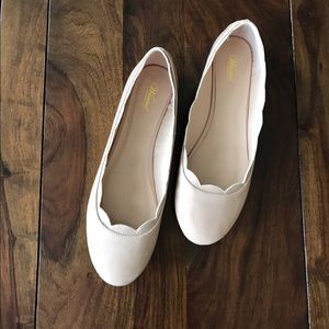 Tan patent leather scallop flats