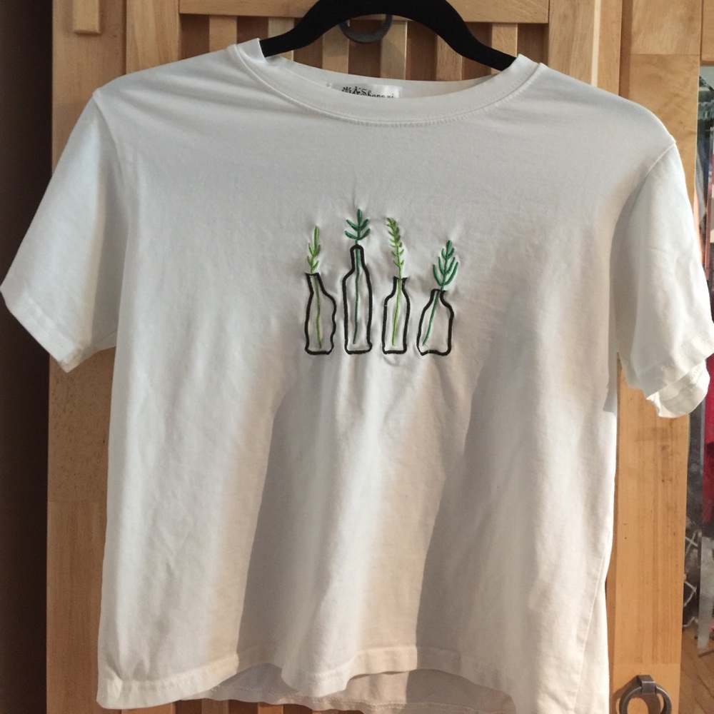 White with plant detailing tee