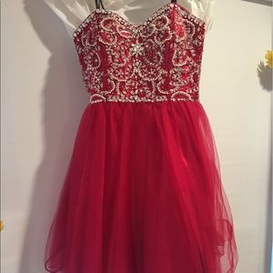 Prom dress.Above the knee.Size 2.Adjustable size