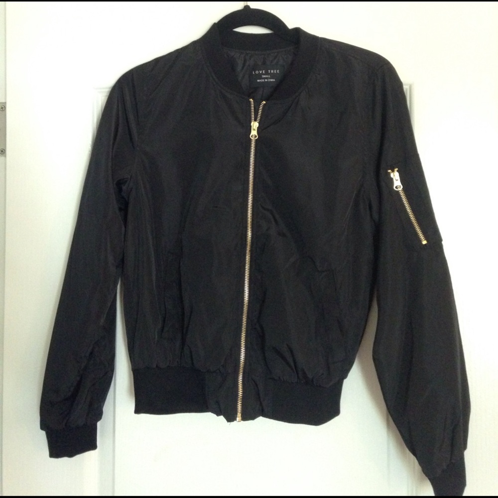 Black Bomber Jacket with Gold Zippers.