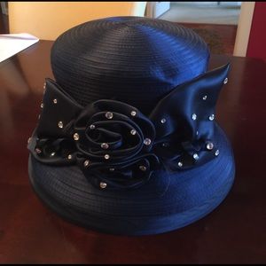 Navy blue Derby/church hat. Worn one time.