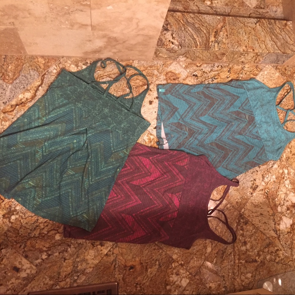 Three Workout Shirts New, never worn.