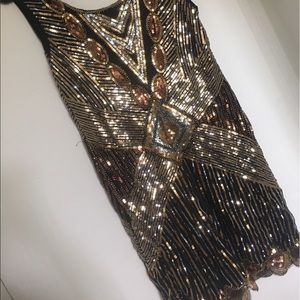 Gasby black and gold sequined dress