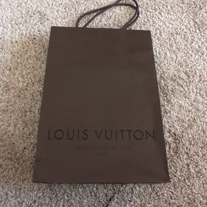FREE Louis Vuitton Bag with a purchase.