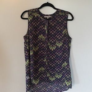 Sleeveless blouse with camisole and zipper