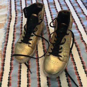 Kids Supra gold hi tops