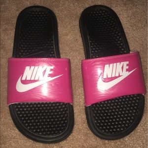 Nike slides.