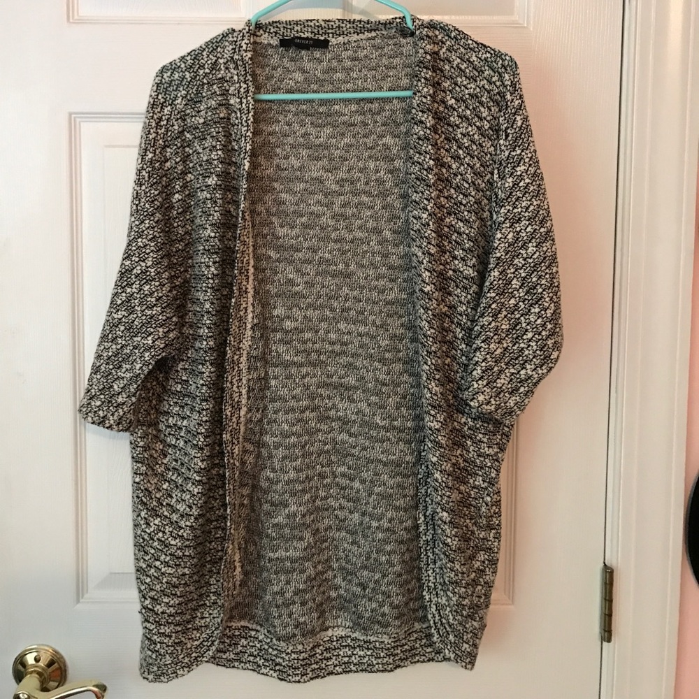Black and with sweater