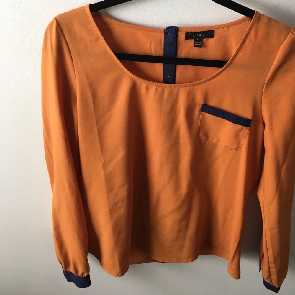 Orange and blue button back blouse
