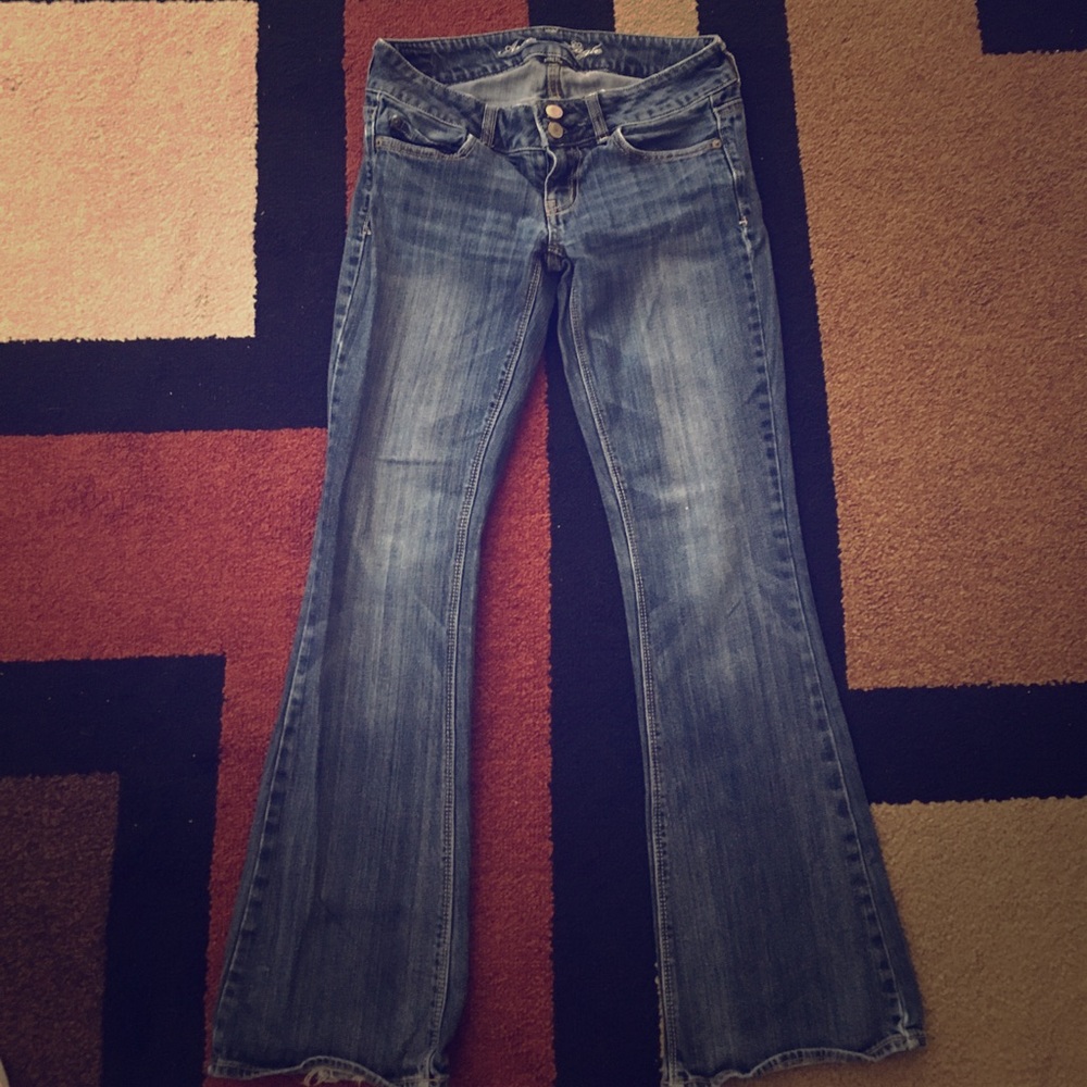 Dark blue, stretch, flare "Artist" jeans.